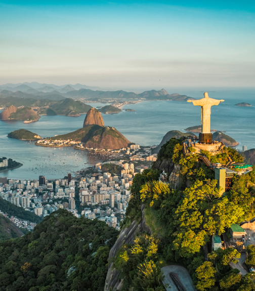 Aerial view of Christ and Botafogo Bay from high angle.