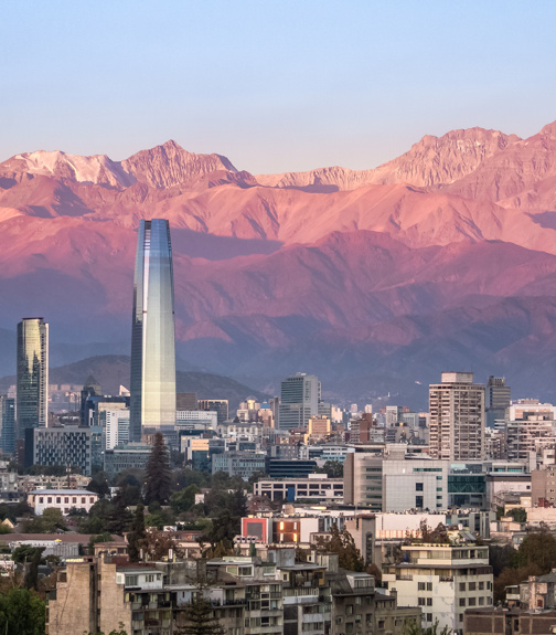 Aerial view of Santiago skyline at sunset with Andes Mountains - Santiago, Chile