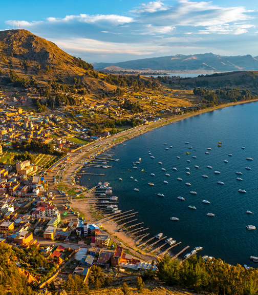 Cityscape of Copacabana city and the Titicaca Lake at sunset, Bolivia.